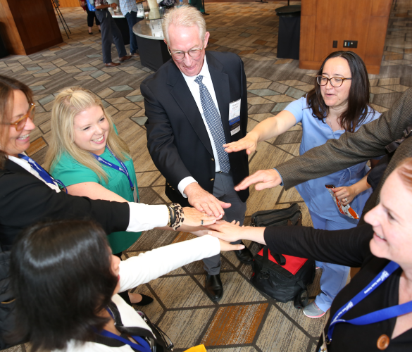 UW UCLA Hands In Team