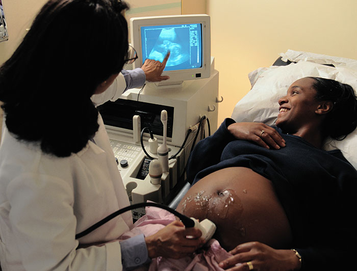 pregnant woman gets ultrasound