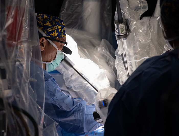 West Virginia University Hospitals. Vinay Badhwar, M.D. and team perform the world’s first combined valve replacement and coronary artery bypass operation