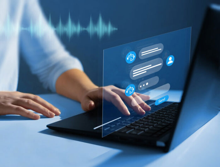 Vanderbilt University Medical Center. Stock composite image of hands typing on laptop with medical holograph superimposed above