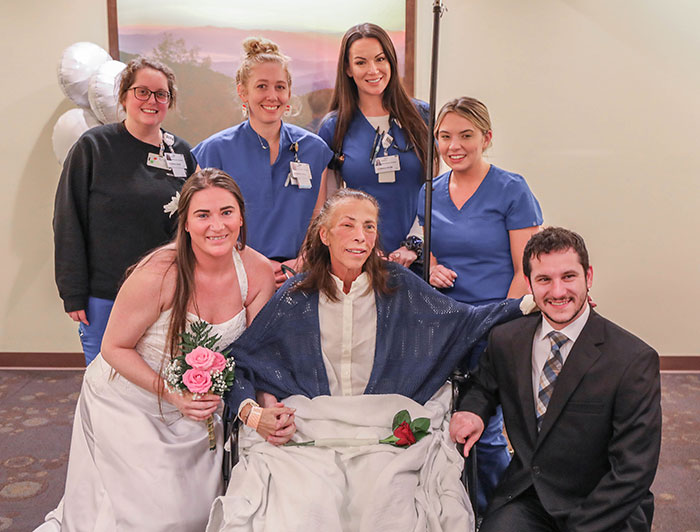 University of Tennessee Medical Center. Front, from left: Samantha Barry, Lynn Barry and Phillip Bastelica; Rear: University of Tennessee Medical Center nurses