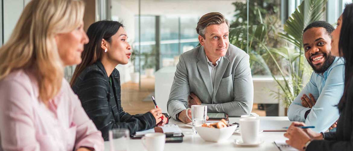 People gathered around a conference table