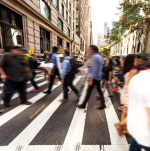 People walking across the street