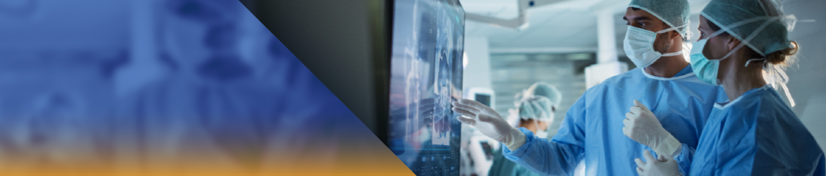 Hospital employees using medical equipment