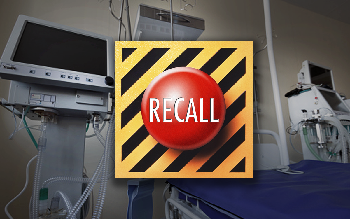 4 Steps to Improve Medical Device Recall Tracking. A large Recall button in front of medical devices.