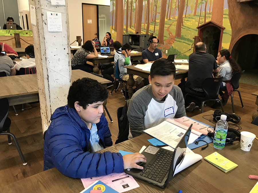 two students at computer at 826 valencia