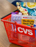 CVS Health Targets Cost Cutting While Refocusing Aetna. A CVS basked filled with personal health items.