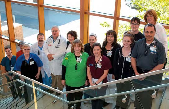 MaineGeneral staff standing on a staircase in a hospital.