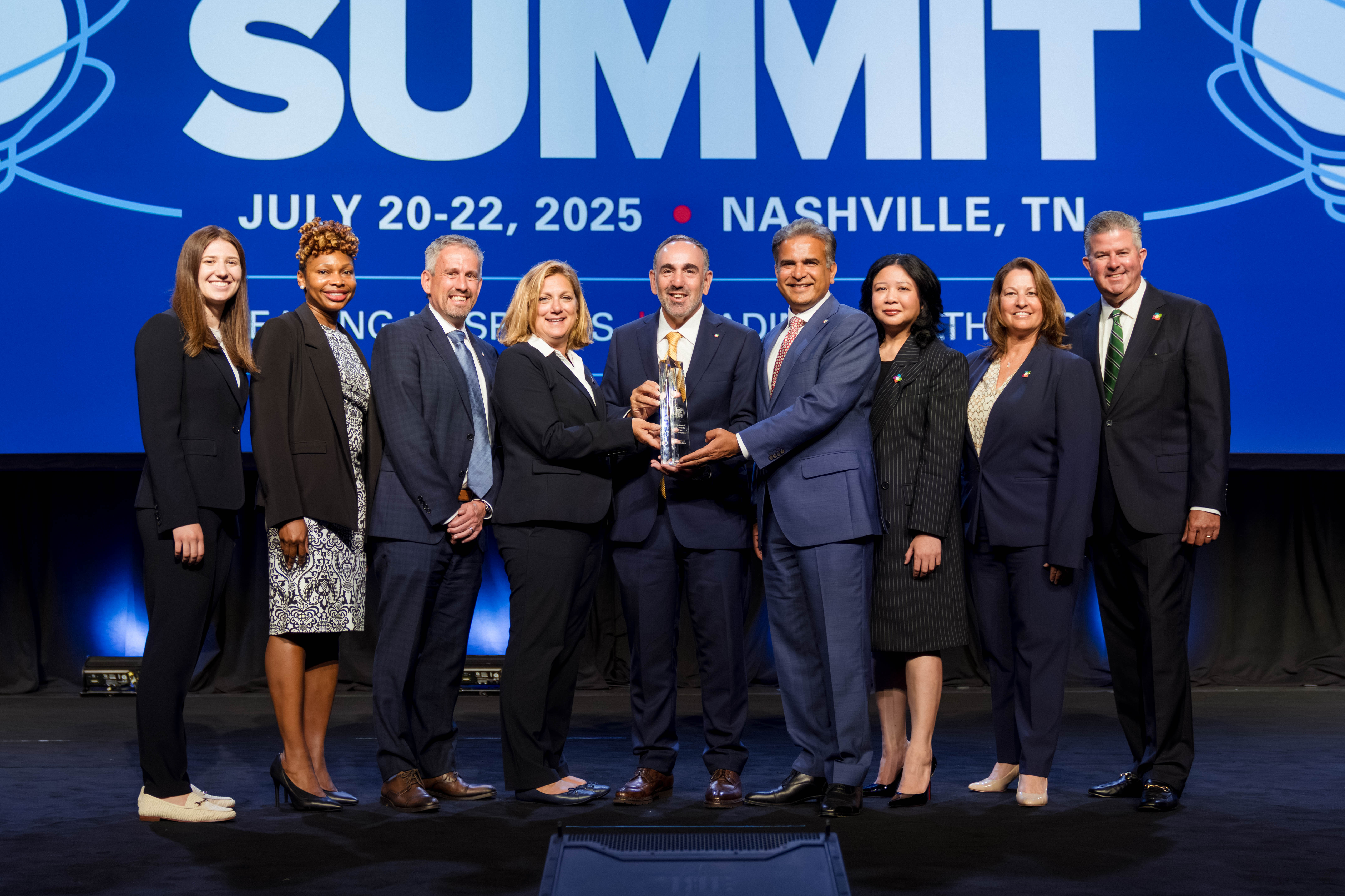 Hartford HealthCare accepts the 2025 AHA Quest for Quality Prize at the 2025 AHA Leadership Summit.