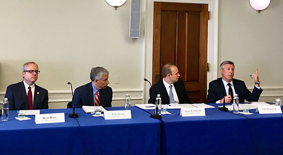 Hill briefing four at table