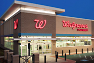 A Walgreens store with the Walgreens logo and name displayed in red lights.