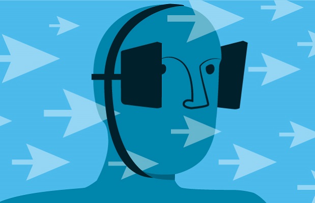 Image of a man working on a computer with blinders on