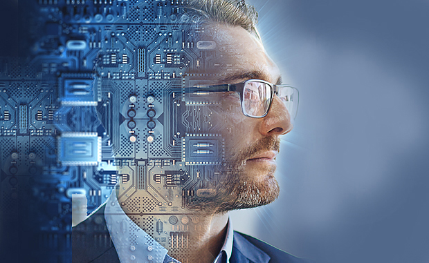 3 Ways CEOs Can Lead Digital Transformation. A CEO looks to the future with the back of his head overlayed with computer chips on a motherboard.