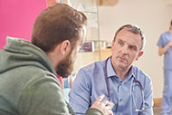 Got a Minute? Tap into Patients’ Social Needs. Patient talking to a clinician.