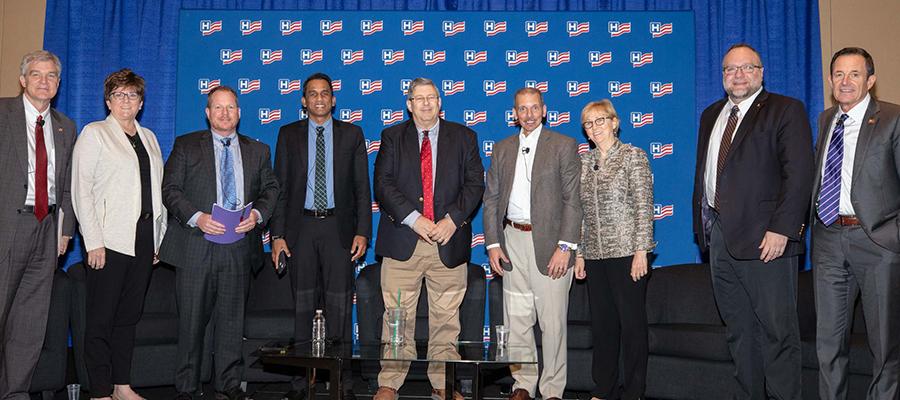 AHA Board Chairman Brian Gragnolati (right) led a discussion on how health care leaders are transforming care.