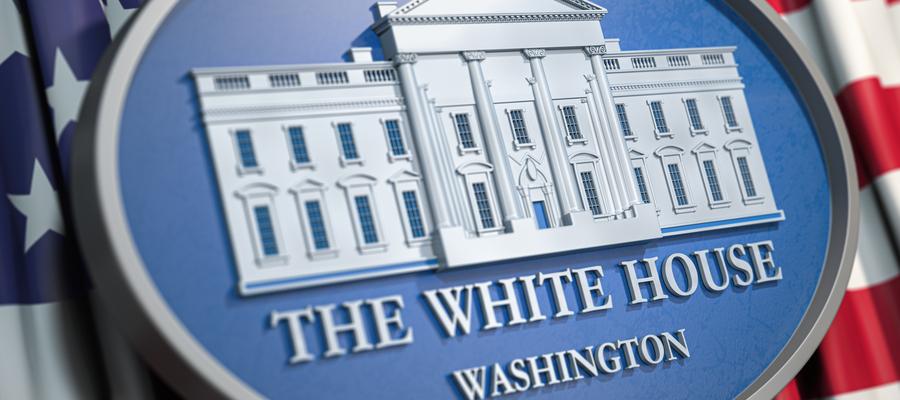 Official White House logo with flag backdrop