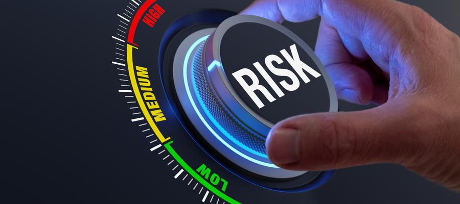 Hand turning "risk" dial