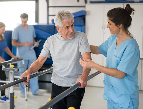 An older man in physical therapy