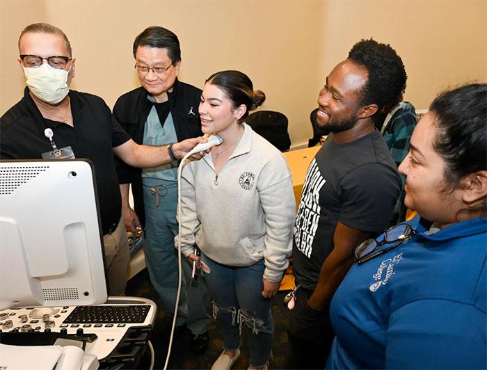Students watch a demonstration at Torrance Memorial Medical Center