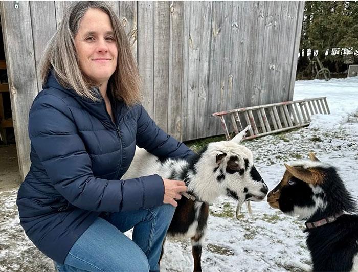 Gifford nurse Jamie Cushman tends goats on her family farm