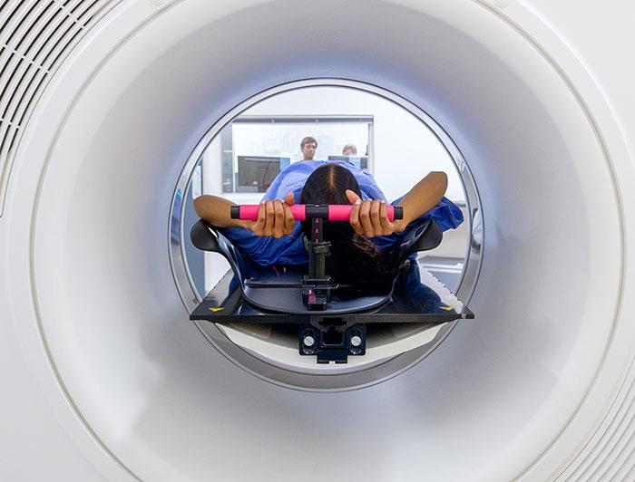 Image of a patient receiving radiation treatment, viewed from inside machine looking out to treatment room