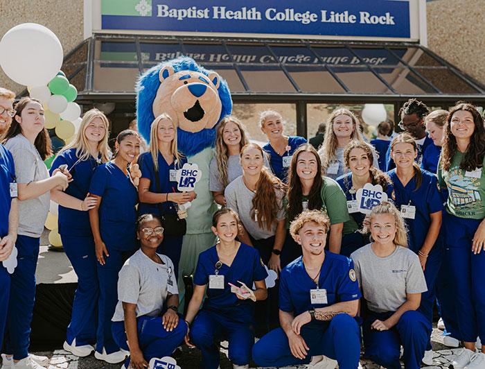 Baptist Health College students pose with mascot