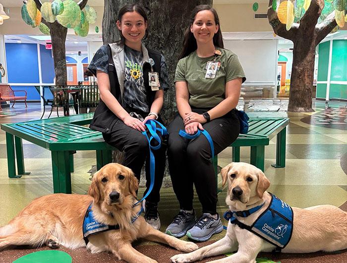 Children's Memorial Hermann workers and dogs