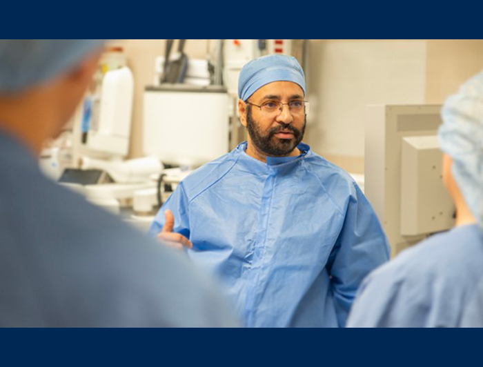 Dr. Gurpreet Bambra of Southern Illinois Health speaks with colleagues